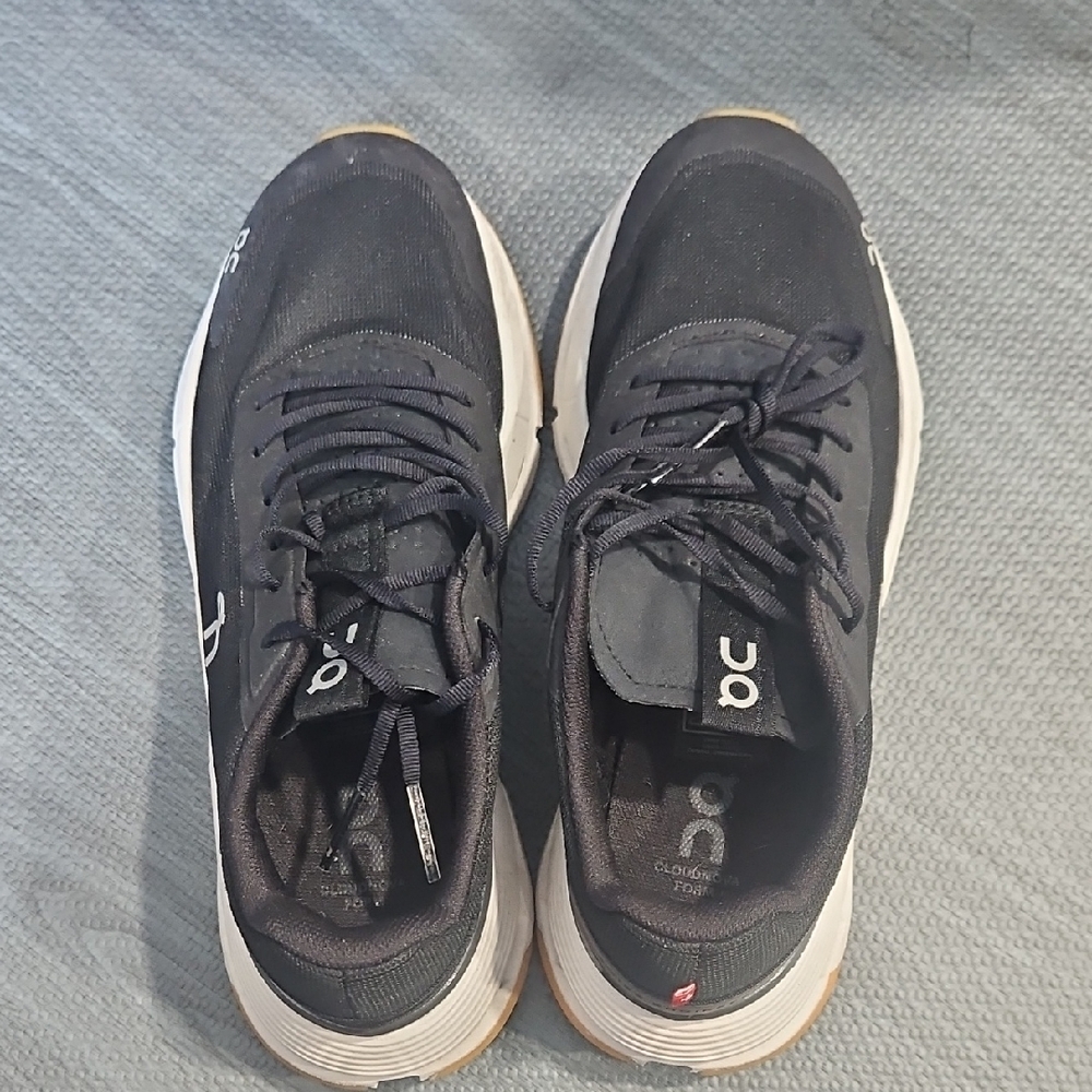 On Running Women's Black and White Sneakers
